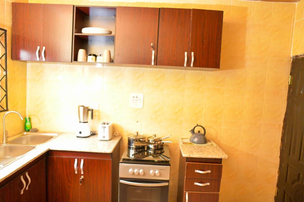 Living Green Apartments Airport Pick Up 贝宁城 外观 照片