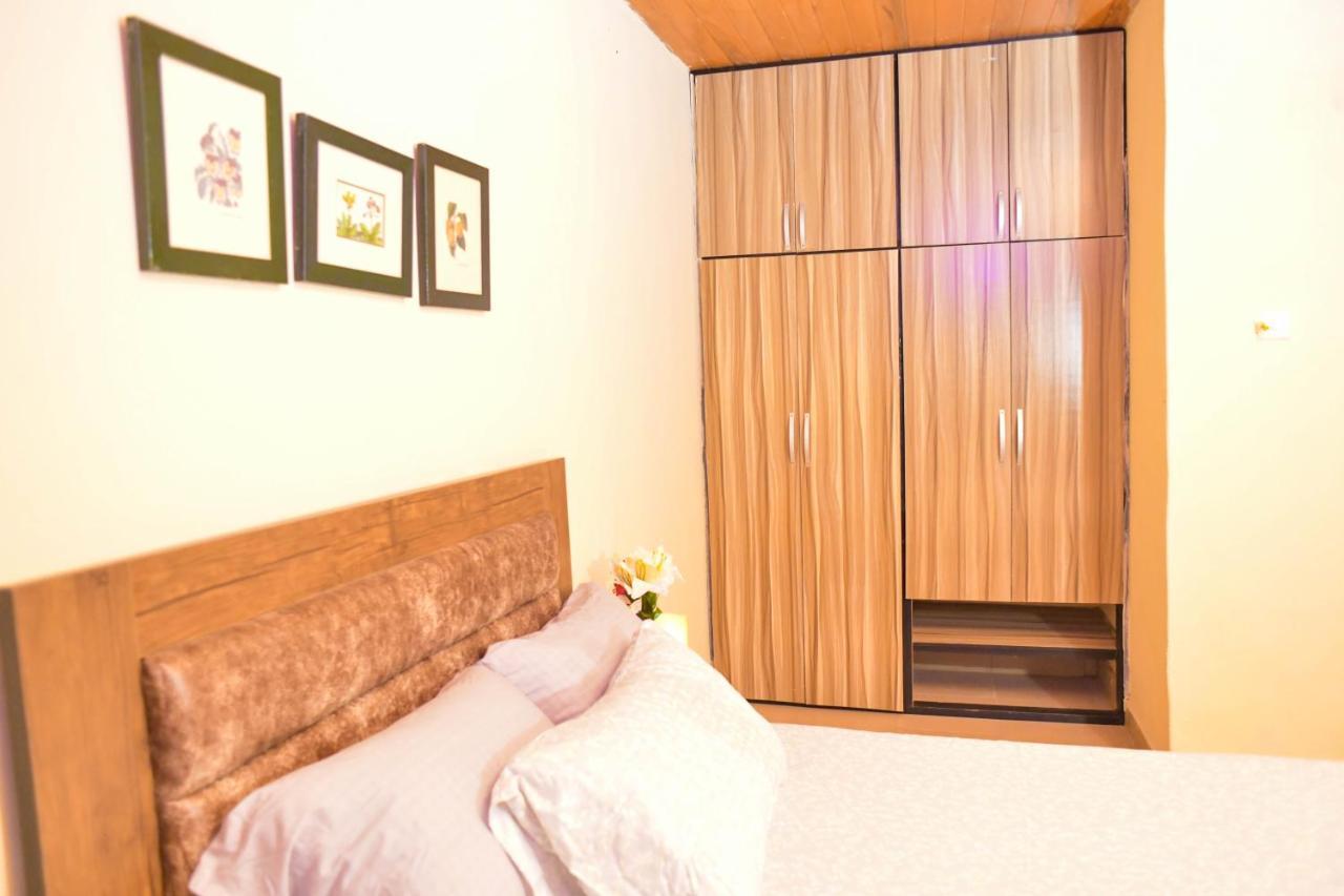 Living Green Apartments Airport Pick Up 贝宁城 外观 照片